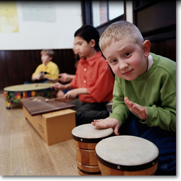 Boy playing bongos